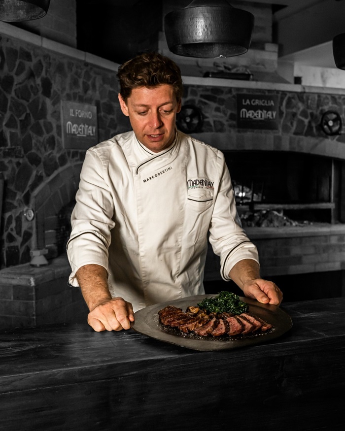 Marco Presenting Steak